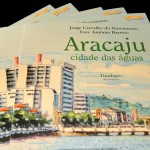cumprimenta um dos autores da obra