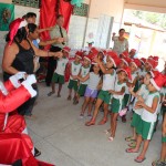 Crianças carentes recebem presentes e visita do Papai Noel da Defensoria Pública -